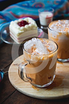 Thai tea milkshank sweet drink on the glass for refreshment