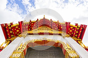 Thai temple door and roof sculpture