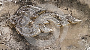 Thai traditional design in Old stucco on temple boundary