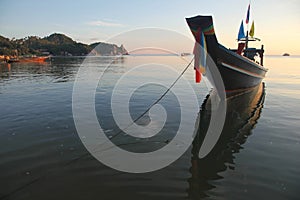 Thai traditional fishing boat moored close to the beach, Chalok Bann Kao, Koh Tao, Thailand