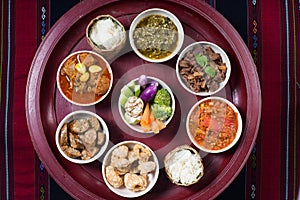 Thai traditional food dinner set called `Kantoke Dinner`