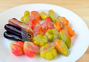 Thai Traditional Mung Beans Marzipan Sweets Called Kanom-Look-Choup Served on White Plate