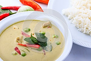 Thai traditional and popular food, Thai chicken green curry intense soup on white background.