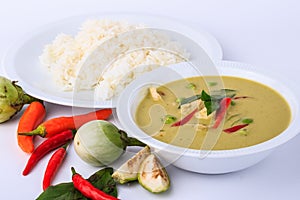 Thai traditional and popular food, Thai chicken green curry intense soup on white background.