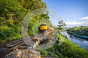 Thai Train on River Kwai Bridge of Kanchanaburi built in World War 2 , Thailand