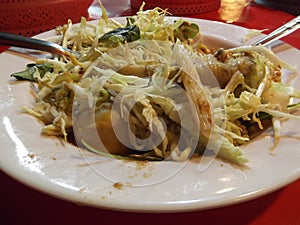 Thai vermicelli eaten with curry mix vegetables, street food, Buddha festival, Samutprakarn ,Thailand.