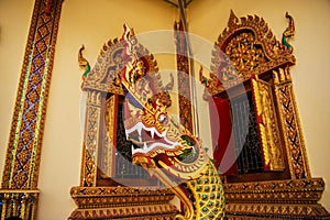 Thai wall art King Naka in the temple