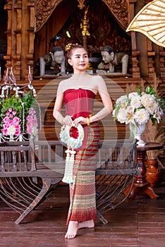 Thai woman dressed in traditional Northern Thailand culture costume