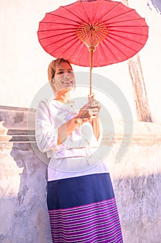 Thai woman with Lanna style background