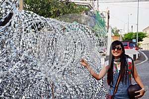 Thai woman portrait with Barbed wire for Defence