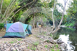 Thai woman portrait sit at tent camp in Suan Phueng