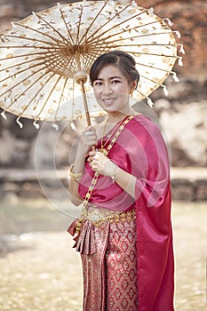 Thai woman wearing period tradition clothes style toothy smiling