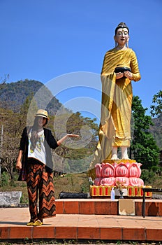 Thai women with Buddha image statue Burma Style