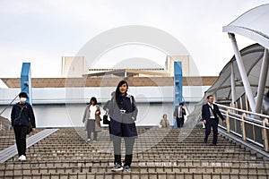 Thai women and Japanese and foreigners people walking go to work at tokyo big sight in Ariake at Koto city in Tokyo, Japan