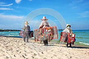 Thai women selling beachwear at beach in Koh Samui