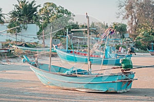 wooden Fishing boat on an island sand beach for Vacation and Beach travel cocnept photo