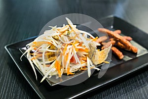 Thai young papaya salad