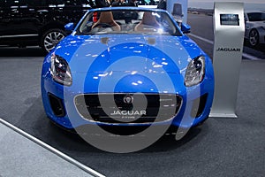 Thailand - Dec , 2018 : close up front view of Jaguar F-type blue color luxury expensive car presented in motor expo Nonthaburi
