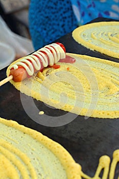 Thailand dessert, Mix flour, coconut and then fried.