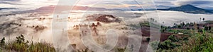 Thailand landscape panorama of the mountains in the mist at sunrise time. Nature panorama.