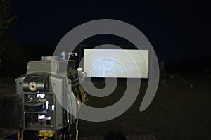 Thailand old analog rotary film movie projector at outdoor cinema movies theater for show people in the Park
