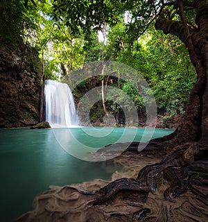 Thailand outdoor photography of waterfall in rain jungle forest.