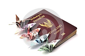 Thailand passport with bird banknotes