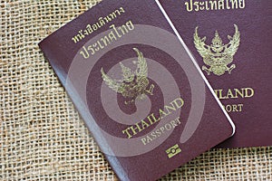 Thailand passport on sack background