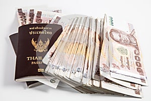 Thailand passport with Thai money