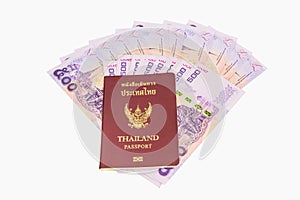 Thailand passport and Thai money. Concept of traveling.