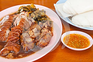 Thailand steamed bun with pork leg stewed (Kha Moo Mantho)