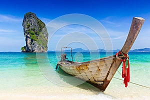 Thailand summer travel sea, Thai old wood boat at sea beach Krabi Phi Phi Island Phuket.