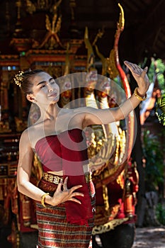 Thailand traditional or cultural dance in Thai costume. The beautiful girl is dancing called Nang Ram, it is noble art of elegance