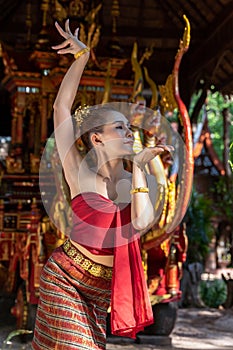 Thailand traditional or cultural dance in Thai costume. The beautiful girl is dancing called Nang Ram, it is noble art of elegance