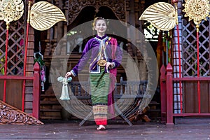 Thailand traditional or cultural dance in Thai costume. Young beautiful woman dressed in beautiful costumes, posing Thai Dancing