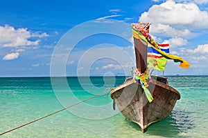 Thailand traditional longtail boat on tropical beach