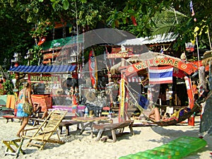 Thailand tropical sand sea beach bar huts colorful furniture