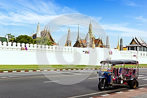 Thailand Tuk Tuk at Grand Palace with blue sky in Bangkok