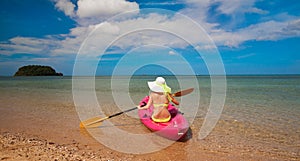 Thailand. Woman sea, bikini, hat, tan, kayak. Libong