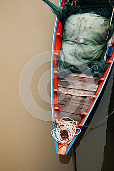 Thailand wooden fishing boat and fishing net in canal top view s