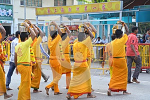 Thaipusam is a Hindu festival where devotees come together for a procession, carrying signs of their devotion and gratitude