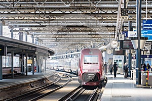 A Thalys high-speed train stationing in Brussels-South railway station