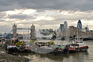Thames houseboats, by Tower Bridge, London