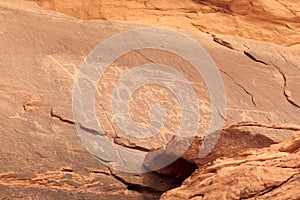 Thamudic and Nabataean petroglyphs and inscriptions on mountain in Wadi Rum desert, Jordan