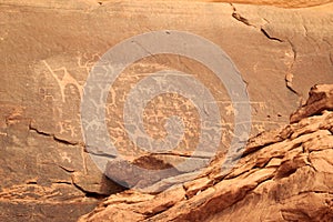 Thamudic and Nabataean petroglyphs and inscriptions on mountain in Wadi Rum desert, Jordan