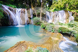 Than sawan Waterfall, Paradise waterfall in Tropical rain forest of Thailand , water fall in deep forest at border of Chaing rai a