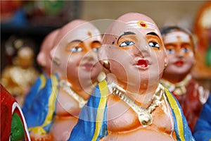 Thanjavur doll, Traditional Indian bobblehead or roly-poly toy made of terracotta material.