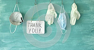 We thank the medical staff  for their devoted work during cornavirus epidemic, symbolic picture,medical gloves, face masks and the
