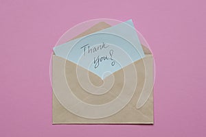 Thank you card inside brown envelope