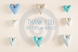 Thank You Doctors and Nurses message with blue heart cushions